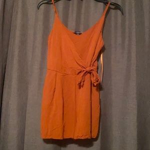 Romper. Burnt orange. Size small
